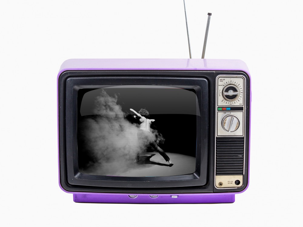 Vintage style old purple television isolated on white